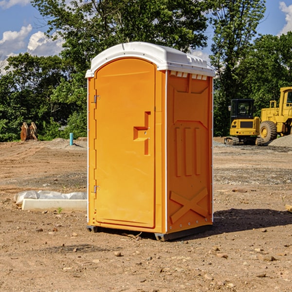 how often are the portable restrooms cleaned and serviced during a rental period in Custer